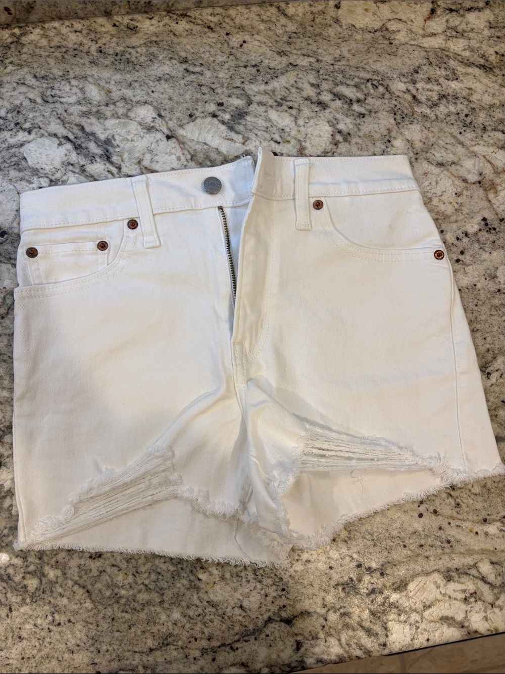 Levi's Women’s White Denim Cutoff Shorts with Frayed Hem